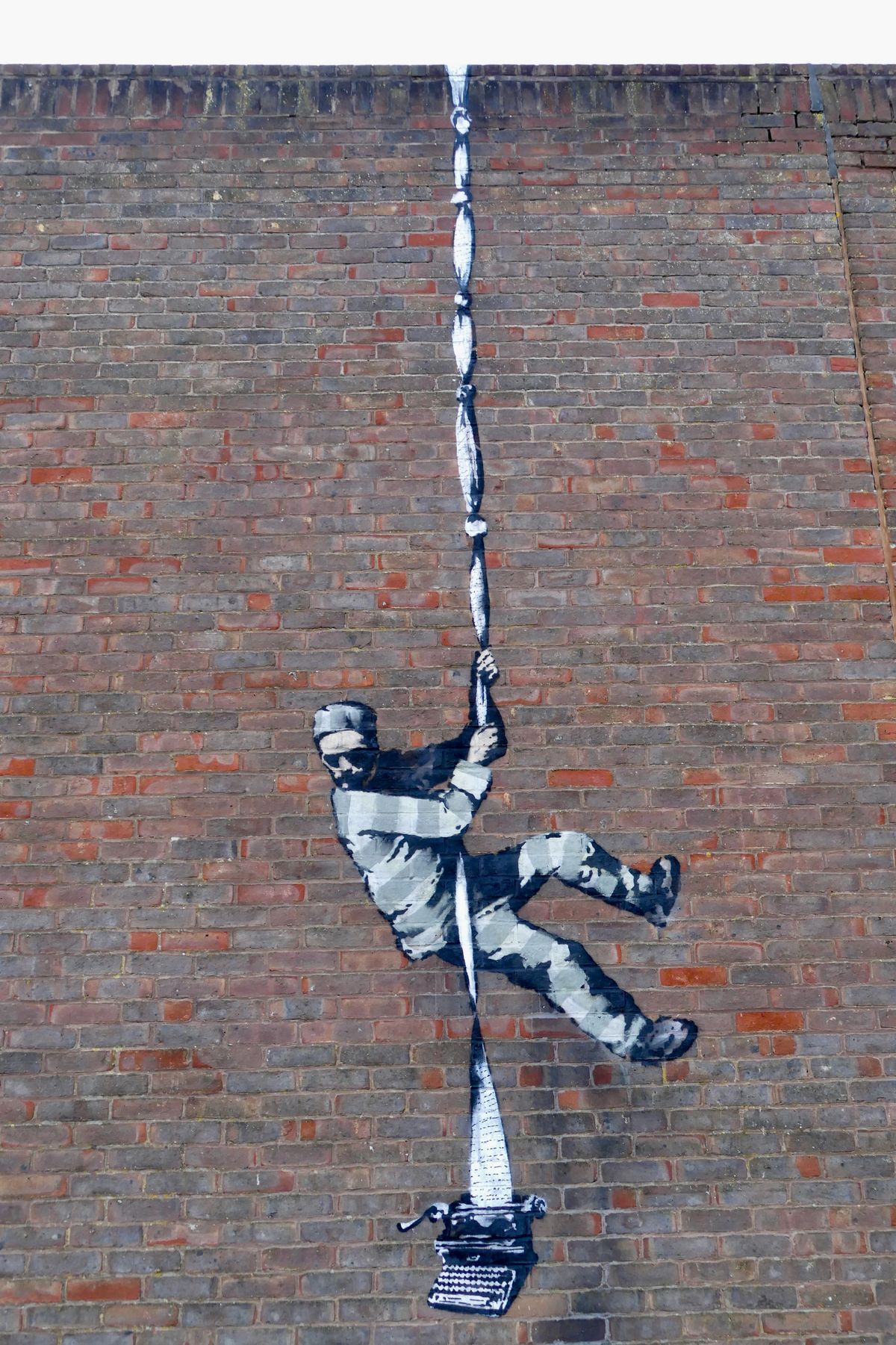 Ein neues Banksy-Wandbild könnte gerade an einer Gefängnismauer aufgetaucht sein